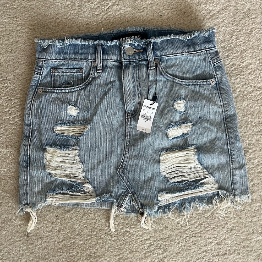 NWT Express denim skirt. distressed. never worn. size 2
